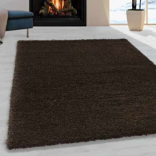 Louisa Ensfarvet Gulvtæppe i Brun fra Rugs by Uniquebeds Home & Living | Flere Størrelser i Firkantet & Rund
