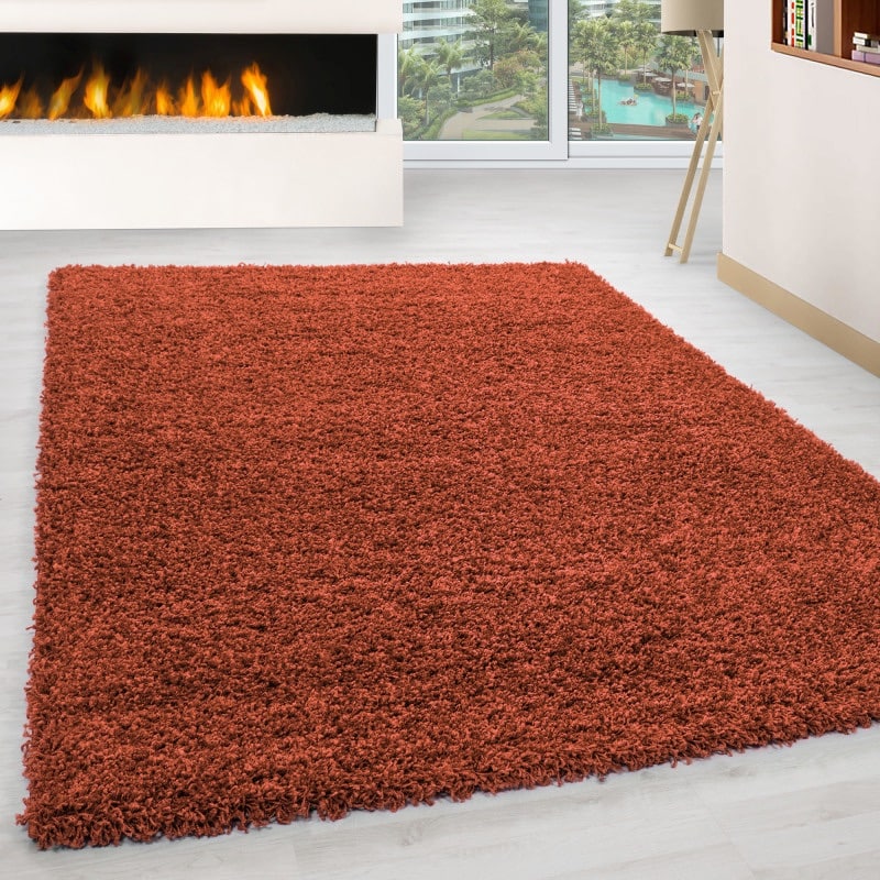 Luna Ensfarvet Fluffy Gulvtæppe i Terra fra Rugs by Uniquebeds Home & Living | Flere Størrelser i Firkantet & Rund
