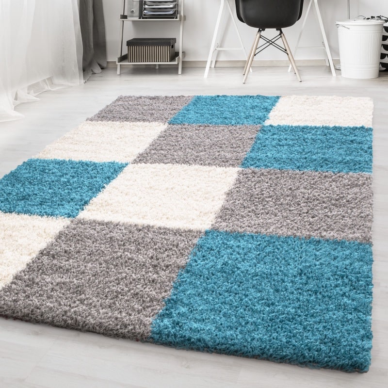 Nora Fluffy Ternet Gulvtæppe i Turkis fra Rugs by Uniquebeds Home & Living | Flere Størrelser