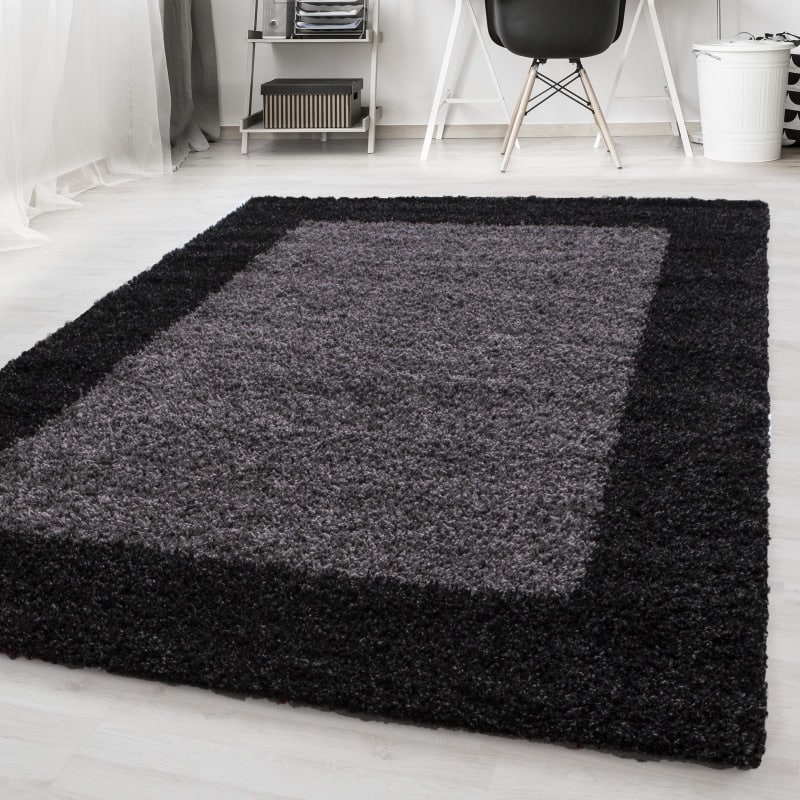 Zoe Fluffy Gulvtæppe i Sort med Kant fra Rugs by Uniquebeds Home & Living | Flere Størrelser i Firkantet & Rund